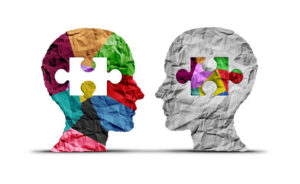Illustration of two heads facing each other